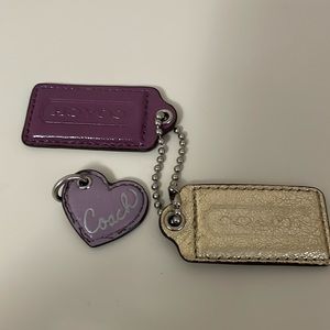 Coach hang fobs and a heart purple hang fob CUTE